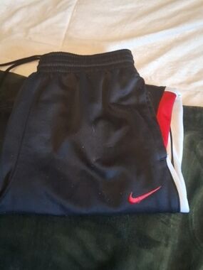 Nike Black Joggers with Red Swoosh and White Trim